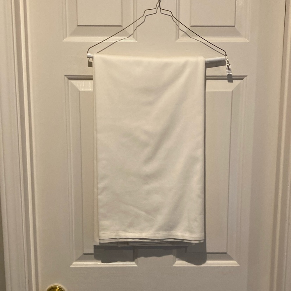 Williams Sonoma Cream Tablecloth 70 x 90 inches.